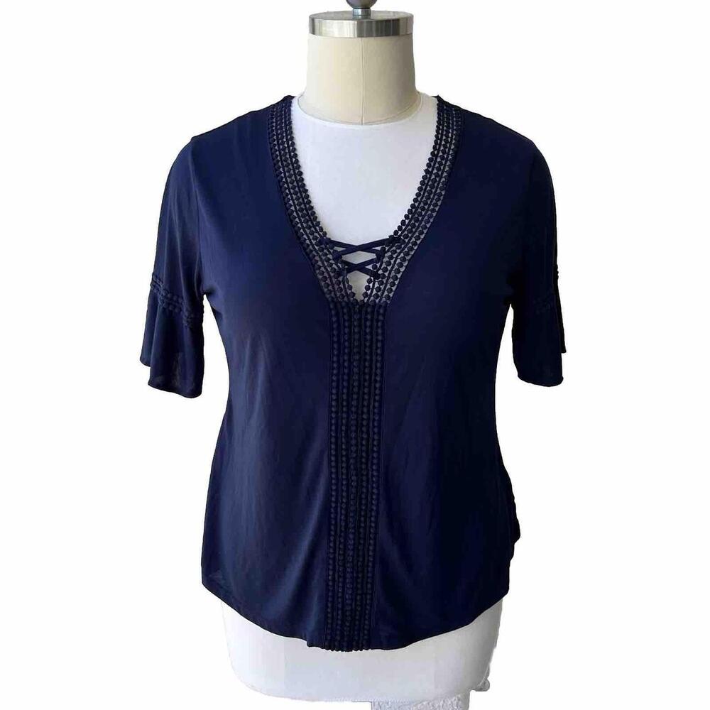 Elevate your wardrobe with this stylish navy blue tunic top from Shannon Ford NY
